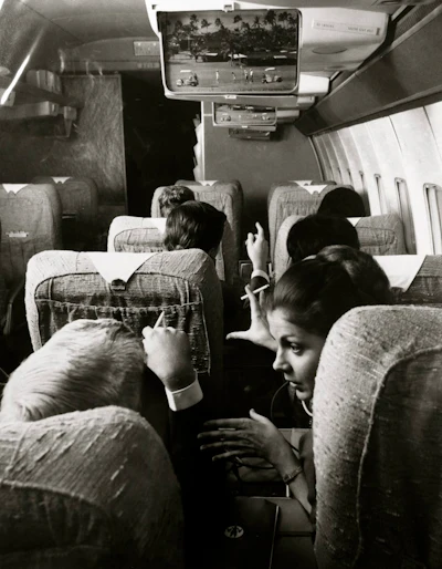 An Astrocolor monitor hangs from the first-class cabin of an American Airlines plane.