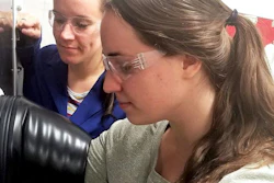 Ellen Matson, left, University of Rochester assistant professor of chemistry, and University of Rochester PhD student Lauren VanGelder at work in Matson's lab. VanGelder is lead author on a paper describing modifications to a redox flow battery that make it nearly twice as effective for electrochemical energy storage.
