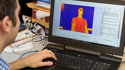 Post-doctoral fellow Philip Saponaro demonstrates the imaging technology being developed in the VIMS lab, which picks up signals from a person in the camera's view.