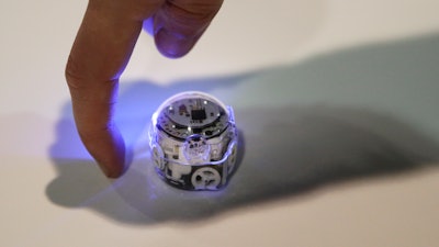 In this Jan. 10, 2018, file photo, the Ozobot Evo, which has sensors to interact with its environment, is demonstrated at CES International in Las Vegas. Evo comes equipped to follow around any finger placed before its frontal camera. “We want kids to immediately engage with a robot,” says Nader Hamda, founder and CEO of the Evo’s maker, Redondo Beach, California-based Ozobot.
