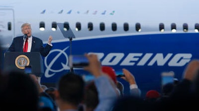 In this Feb. 17, 2017, file photo, President Donald Trump to speaks to Boeing employees in the final assembly building at Boeing South Carolina in North Charleston, S.C.