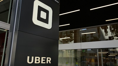 This June 21, 2017, file photo shows the building that houses the headquarters of Uber, in San Francisco. Ride-hailing giant Uber's full-year net loss widened to $4.5 billion in 2017 as the company endured a tumultuous year that included multiple scandals, a lawsuit alleging the theft of trade secrets and the replacement of its CEO. A person briefed on the results provided some numbers and confirmed the accuracy of The Information's story to The Associated Press on Wednesday, Feb. 14, 2018.