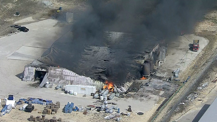 In this image from video by KDFW, a fire burns at the Tri-Chem Industries plan in Cresson, Texas. Officials said fears of another blast amid the toxic chemicals prevented crews from battling the blaze.