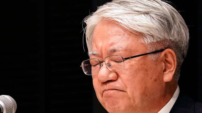 Kobe Steel President and CEO Hiroya Kawasaki reacts as he listens to a reporter's question during a press conference in Tokyo, Tuesday, March 6, 2018. Kawasaki is stepping down over a scandal that surfaced last year involving massive falsification of inspections data of the company’s products.