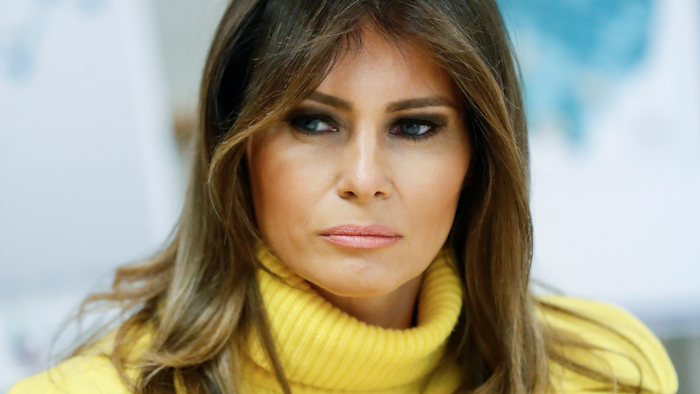 In this Feb. 5, 2018 photo, first lady Melania Trump listens as she meets with personnel at Cincinnati Children's Hospital Medical Center, in Cincinnati. First lady Melania Trump is bringing together tech giants to talk about ways to fight cyberbullying and promote Internet safety, representatives of three companies said Tuesday, March 13.