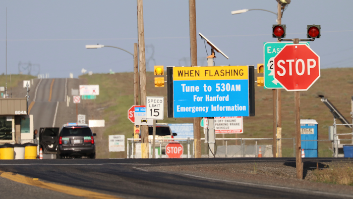In this May 9, 2017, file photo, an emergency sign flashes outside the Hanford Nuclear Reservation in Benton County Tuesday in Washington state. The federal government is demanding that the company building a giant nuclear waste treatment plant in Washington state provide records proving that the steel used in the nearly $17 billion project meets safety standards.