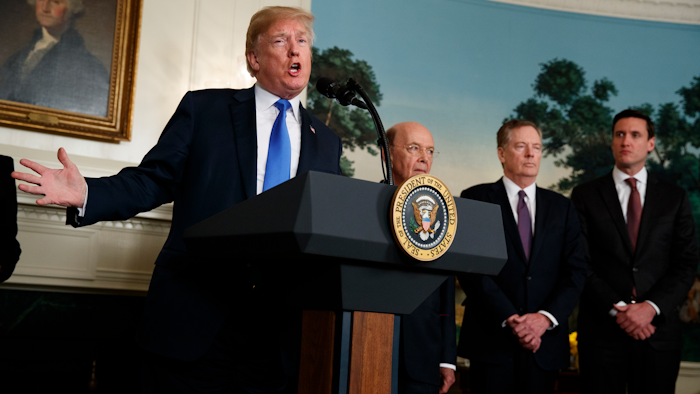 President Donald Trump speaks before he signs a presidential memorandum imposing tariffs and investment restrictions on China in the Diplomatic Reception Room of the White House, Thursday, March 22, 2018, in Washington. Secretary of Commerce Wilbur Ross, United States Trade Representative Robert Lighthizer, and White House homeland security adviser Tom Bossert listen.