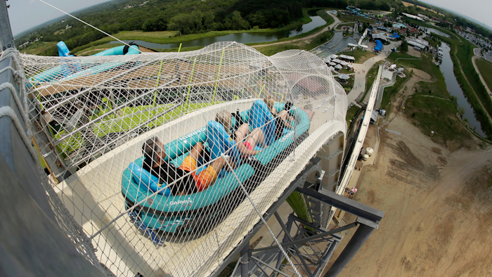 A former executive with the Kansas water park where a 10-year-old boy died on the giant waterslide has been charged with involuntary manslaughter. Tyler Austin Miles, an operations director for Schlitterbahn, was booked into the Wyandotte County jail Friday, March 23, 2018 and is being held on $50,000 bond. Caleb Schwab died in August 2016 on the 17-story Verruckt water slide at the park in western Kansas City, Kansas.