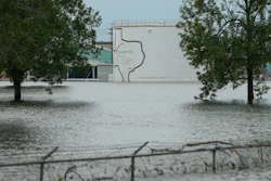 In this Aug. 30, 2017 photo, the Arkema chemical plant is flooded from Hurricane Harvey in Crosby, Texas, northeast of Houston. Nearby residents complain of a 'bitter taste' about the sparse information authorities provided when chemicals at the plant caught fire. They say the company failed to provide sufficient warning beforehand while environmental officials misled them with assurances that the air and water were safe. Critics say testing by authorities and contractors was inadequate to determine whether public health was threatened.