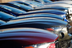 In this Sunday, Jan. 7, 2018, photograph, a long line of unsold 2017 and 2018 Maserati Levantes sits on a dealer's lot in Highlands Ranch, Colo. Industry analysts expect February 2018 sales to tail off from a year ago as automakers ease up on cash discounts and other incentives that hit record highs last year. Most automakers report sales figures Thursday, March 1.