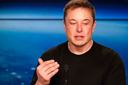 In this Feb. 6, 2018, file photo, Elon Musk, founder, CEO of SpaceX and CEO of Tesla Inc., speaks at a news conference after the Falcon 9 SpaceX heavy rocket launched successfully from the Kennedy Space Center in Cape Canaveral, Fla. Shareholders of electric car and solar panel maker Tesla Inc. are voting on a pay package for Musk that could net him more than $50 billion if he meets lofty milestones over the next decade that include raising the company's market value tenfold.