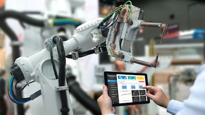 Engineer Hand Using Tablet, Heavy Automation Robot Arm Machine In Smart Factory Industrial With Tablet Real Time Monitoring System Application Industry 4th Iot Concept 687663970 3868x2579 (1)