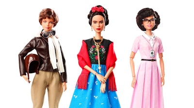 This product image released by Barbie shows dolls in the image of pilot Amelia Earhart, left, Mexican artist Frida Kahlo and mathematician Katherine Johnson, part of the Inspiring Women doll line series being launched ahead of International Women’s Day.