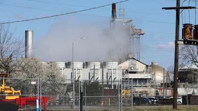 A March 13, 2018 photo shows the AdvanSix plant in Hopewell, Va. State and federal authorities have responded to AdvanSix, an industrial chemical manufacturing facility, as part of what a Virginia official says is a criminal environmental investigation. AdvanSix said in a statement that authorities were at the company's plant in Hopewell Tuesday to execute a search warrant. Spokeswoman Debra Lewis says the company is 'still learning' about the investigation and she can't provide further details.