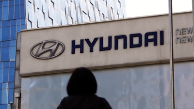 In this April 26, 2017, file photo, the logo of the Hyundai Motor Co. is displayed at the automaker's showroom in Seoul, South Korea. Air bags in some Hyundai and Kia cars failed to inflate in crashes and four people are dead. Now the U.S. government's road safety agency wants to know why. The National Highway Traffic Safety Administration says it's investigating problems that affect an estimated 425,000 cars made by the Korean automakers. The agency also is looking into whether the same problem could happen in vehicles made by other companies.
