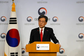 South Korean Trade Minister Kim Hyun-chong answers a reporter's question during a briefing at Foreign Ministry in Seoul, South Korea, Monday, March 26, 2018. South Korea has agreed to further open its auto market to the United States as the two countries reached an agreement in principle on amending their six-year-old free trade agreement.
