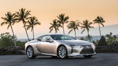 This undated photo provided by Toyota shows the Lexus LC 500h. The GS 450h midsize sedan, the LC 500h sport coupe and the RX 450h SUV use a six-cylinder engine that's bolstered by battery-fed electric motors. They aren't plug-ins, so these hybrids do all the hybrid-related thinking for the driver and ask nothing in return.