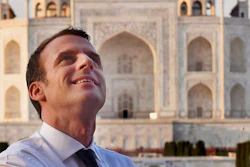 French President Emmanuel Macron admires the Taj Mahal in Agra, India.