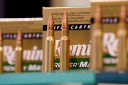 In this Tuesday, Jan. 15, 2013 file photo, Remington rifle cartridges are displayed at the 35th annual SHOT Show in Las Vegas. U.S. gun maker Remington Outdoor Company has filed for bankruptcy protection after months of financial problems, falling sales and lawsuits tied to the Sandy Hook Elementary School massacre. Records from the bankruptcy court of the district of Delaware show that the company filed late Sunday, March 25, 2018.