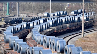 Steel coils sit on wagons when leaving the thyssenkrupp steel factory in Duisburg, Germany, Friday, March 2, 2018. U.S. President Donald Trump risks sparking a trade war with his closest allies if he goes ahead with plans to impose steep tariffs on steel and aluminum imports, German officials and industry groups warned Friday.