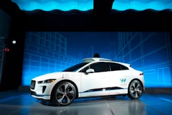 The Jaguar I-Pace vehicle is introduced Tuesday, March 27, 2018, in New York. Self-driving car pioneer Waymo will buy up to 20,000 of the electric vehicles from Jaguar Land Rover to help realize its vision for a robotic ride-hailing service. The commitment announced Tuesday marks another step in Waymo's evolution from a secret project started in Google nine years ago to a spin-off that's gearing up for an audacious attempt to reshape the transportation business.