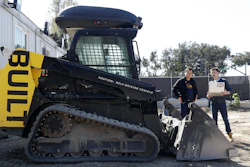 Bichen Wu, center, and Ed Walker use a laptop to determine what a autonomous bulldozer is seeing at Built Robotics Wednesday, Feb. 21, 2018, in San Francisco. Backed by Silicon Valley money, tech startups are developing self-driving bulldozers, drones to inspect work sites and robot bricklayers that can lay bricks faster than human and work without lunch breaks.