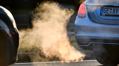 In this Feb. 27, 2018 file photo commuters drive in their cars to work in Gelsenkirchen, Germany. Thousands of people die prematurely each year in Germany from the harmful effects of nitrogen dioxide, a gas that’s produced by diesel engines, according to a government-sponsored report published Thursday March 8, 2018.