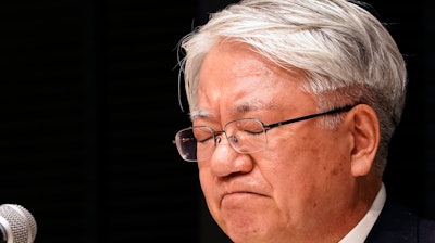 Kobe Steel President and CEO Hiroya Kawasaki reacts as he listens to a reporter's question during a press conference in Tokyo, Tuesday, March 6, 2018. Kawasaki is stepping down over a scandal that surfaced last year involving massive falsification of inspections data of the company’s products.