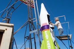 In this March 6, 2018, file photo, 'Mad' Mike Hughes begins work on repairing a steam leak after he scrubbed his launch attempt of his steam-powered rocket near Amboy, Calif. The self-taught rocket scientist who believes the Earth is flat propelled himself about 1,000 feet into the air before a hard-landing in the Mojave Desert that left him injured Saturday, March 24, 2018. Hughes tells The Associated Press that he injured his back but is otherwise fine after Saturday's launch near Amboy, Calif.