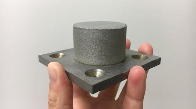 The cylinder shown here is an amorphous iron alloy, or metallic glass, made using an additive manufacturing technique.