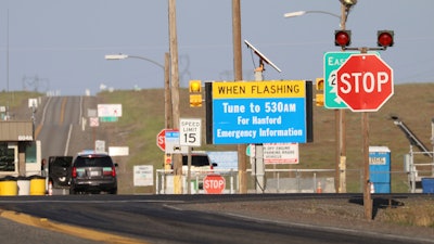 In this May 9, 2017, file photo, an emergency sign flashes outside the Hanford Nuclear Reservation in Benton County Tuesday in Washington state. The federal government is demanding that the company building a giant nuclear waste treatment plant in Washington state provide records proving that the steel used in the nearly $17 billion project meets safety standards.