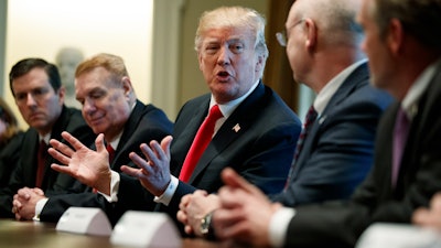 President Donald Trump speaks during a meeting with steel and aluminum executives in the Cabinet Room of the White House, Thursday, March 1, 2018, in Washington. From left, Roger Newport of AK Steel, John Ferriola of Nucor, Trump, Dave Burritt of U.S. Steel Corporation, and Tim Timkin of Timken Steel.