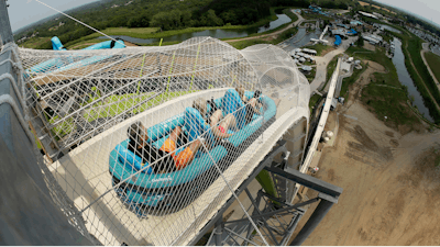 A former executive with the Kansas water park where a 10-year-old boy died on the giant waterslide has been charged with involuntary manslaughter. Tyler Austin Miles, an operations director for Schlitterbahn, was booked into the Wyandotte County jail Friday, March 23, 2018 and is being held on $50,000 bond. Caleb Schwab died in August 2016 on the 17-story Verruckt water slide at the park in western Kansas City, Kansas.