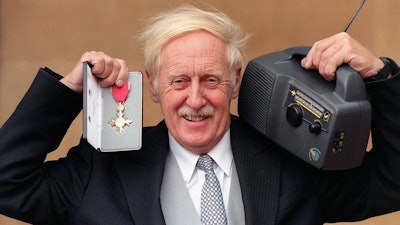An Oct. 9, 1997 photo from files of Trevor Baylis, with his OBE, and a wind-up radio. Trevor Baylis, creator of the clockwork or wind-up radio, has died. He was 80. David Bunting, CEO of Trevor Baylis Brands, says Baylis died Monday, Madrch 5, 2018 after a lengthy illness.