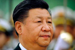 In this March 29, 2018, file photo, Chinese President Xi Jinping reviews an honor guard during a welcome ceremony at the Great Hall of the People in Beijing. Xi has promised to cut China's auto import tariffs and ease restrictions on foreign ownership in its auto industry amid an escalating tariff spat with Washington, in a speech Tuesday, April 10, 2018 at a business conference.