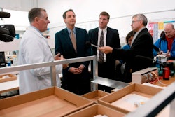 In this 2003 file photo CanadaDrugs.com Director of Pharmacy Robert Fraser, left, takes Minnesota Gov. Tim Pawlenty, second left, on a tour of the Internet pharmacy