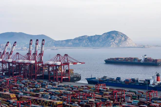 In this March. 29, 2018 photo, container ships is docked at the Yangshan port in Shanghai. President Donald Trump has instructed the U.S. trade representative to consider slapping an additional $100 billion in tariffs on Chinese goods in a dramatic escalation of the trade dispute between the two countries. The news comes a day after Beijing announced plans to tax $50 billion in U.S. products, including soybeans and small aircraft, in response to a U.S. move earlier this week to slap tariffs on $50 billion in Chinese imports.