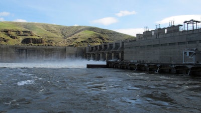 Water moves through a spillway of the Lower Granite Dam on the Snake River near Almota, Washington.