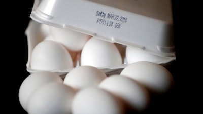 A carton of eggs that expired on March 22nd is shown Friday, March 30, 2018 in Phoenix. This year's Easter eggs may already hard-boiled, dyed and laid in a basket, but next year's batch might be a little less fresh. State lawmakers are on the verge of passing a proposal that would put a 45-day expiration date label on Grade A eggs, clearing the way for a longer window of use than the a current 24-day sell-by date. That means consumers could be cracking eggs that left the farm more than six weeks ago.