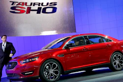 This April 20, 2011, file photo shows Mark Fields, executive vice president, Ford Motor Company, introducing the 2013 Ford Taurus SHO at the New York International Auto Show. In about a year, a car that once was the most popular in America will die for a second time. Ford Taurus, rest peacefully in heaven’s salvage yard. Blame the full-size sedan’s slow death on the national obsession with SUVs and Ford Motor Co.’s need to slash costs and remake itself for a new era of self-driving cars and shuttles. Ford announced the car’s demise on Wednesday, April 25, 2018, as part of major restructuring plan to focus capital spending on more popular SUVs and technology needed to morph into a mobility company.