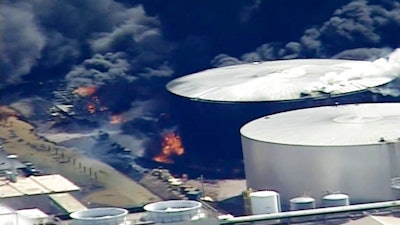 This aerial image from video provided by KSTP-TV in Minneapolis, shows smoke rising from the Husky Energy oil refinery after an explosion Thursday, April 26, 2018, at the plant in Superior, Wis. Authorities say several people were injured in the explosion.