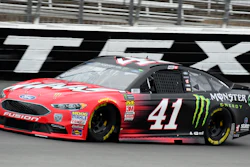 Kurt Busch comes out of Turn 4 during a practice session for a NASCAR Cup series auto race in Fort Worth, Texas.