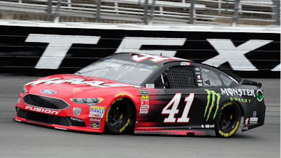 Kurt Busch comes out of Turn 4 during a practice session for a NASCAR Cup series auto race in Fort Worth, Texas.