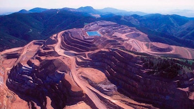 This 1998 file photo shows the now-defunct Zortman-Landusky mine in the Little Rocky Mountains. An Idaho mining company is asking a Montana judge to strike down its designation as a 'bad actor' over past pollution, saying the label could stall two mines proposed beneath a wilderness area.