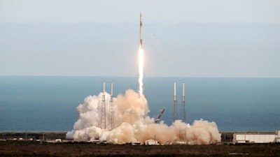 A SpaceX Falcon 9 rocket lifts off from launch complex 40 at the Cape Canaveral Air Force Station in Cape Canaveral, Fla., Monday, April 2, 2018. The spacecraft is on its 14th operational cargo delivery flight to the International Space Station.