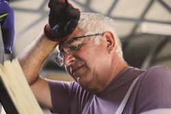 Senior Man In Workshop Worried Man Reading His Planner 860954184 2125x1417