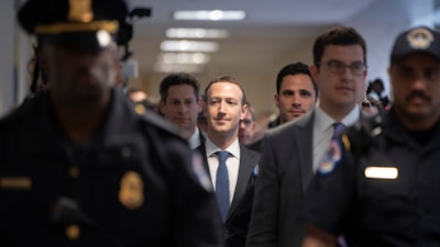 Facebook CEO Mark Zuckerberg arrives on Capitol Hill in Washington, Monday, April 9, 2018, to meet with Sen. Dianne Feinstein, D-Calif., the ranking member of the Senate Judiciary Committee.