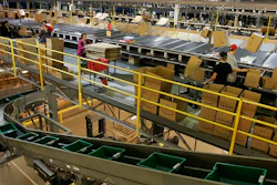 In this Dec. 13, 2005 file photo, workers fill boxes with merchandise at the Amazon fulfillment center in Fernley, Nev. Online retailer Amazon said Wednesday, April 4, 2018, it will build another warehouse packing and distribution center in the Las Vegas area. The facility should open next year on 800,000-square-feet of vacant land east of Interstate 15, not far from the Las Vegas Motor Speedway, the company and city of North Las Vegas said in statements.