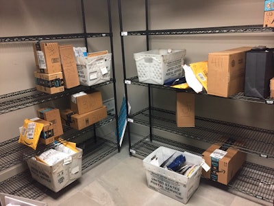 Packages from Internet retailers are delivered with the U.S. Mail in a apartment building mail room in Washington.