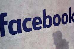 This Jan. 17, 2017, file photo shows a Facebook logo being displayed in a start-up companies gathering at Paris' Station F, in Paris. Facebook is on the offensive to try to contain swirling concerns about how it protects the data of its 2.2 billion members. As CEO Mark Zuckerberg prepares to face Congress on Tuesday, April 10, 2018, and the company rolls out new privacy rules, the social media juggernaut is facing the most serious challenge in its 14-year-history and seeking to maintain people’s trust and avoid a user exodus